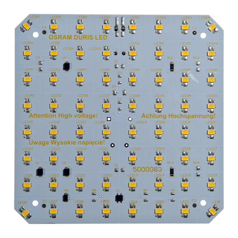 Rectangular LED module PCB with a printed high-voltage warning and integrated components